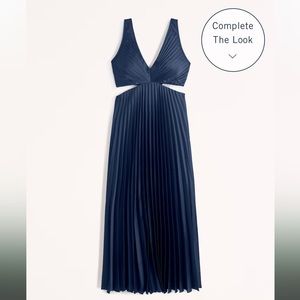 Abercrombie navy pleated dress with cutouts. Size large.